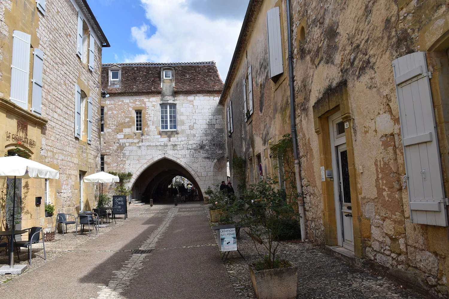The covered arcades of Place des Cornières